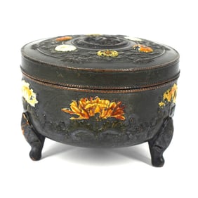 An antique patinated and cold painted metal box and cover