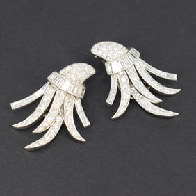 A pair of platimum and diamond spray earrings