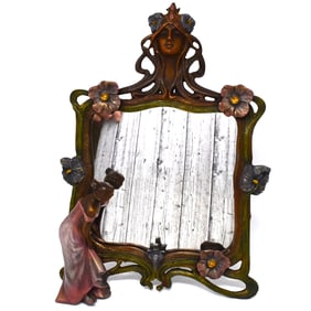 An Art Nouveau style cold painted Iron figural table mirror