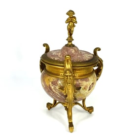 A 19th. Cent. French ormolu mounted marble urn & cover