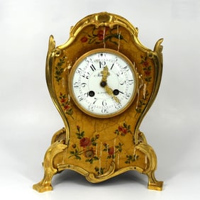 Antique French Rococo style ormolu mounted mantel clock