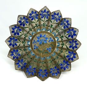 A vintage gilt metal filigree and enamel dish