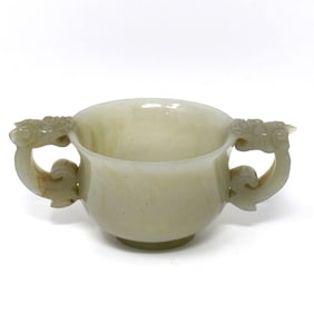 A carved jade (?) chilong cup