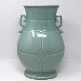 A large Chinese celadon glazed Hu-form vase