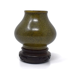 A Chinese teadust glazed vase