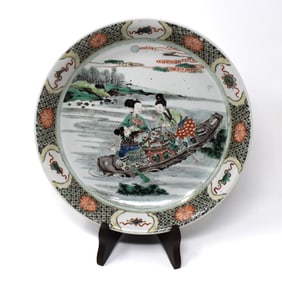 A large Chinese famille verte 'immortals' porcelain dish