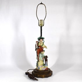 A Chinese famille rose porcelain figurine made into a lamp