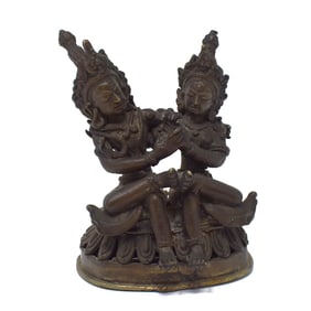 An antique or vintage Tibetan bronze group 'Yab-Yum'