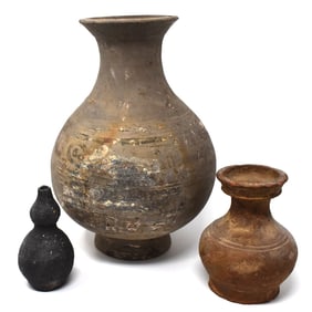 A grouping of three Chinese pottery vases