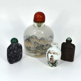 A grouping of four Chinese snuff bottles
