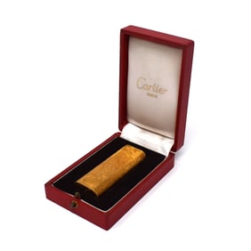 A vintage Cartier gold-plated lighter in original case