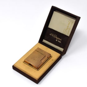 S.T. Dupont gold-plated lighter in original case