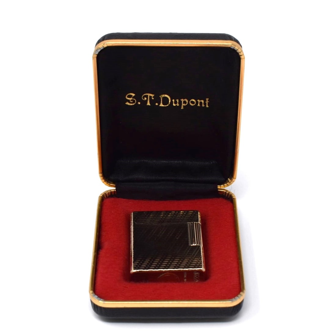 S.T. Dupont gold-plated lighter in original case: A vintage S.T. Dupont gold-plated lighter in case. Marked 'S.T. Dupont, paris, made in france', numbered ' F8EN09'. Approximate measurements: 47mmx34mm