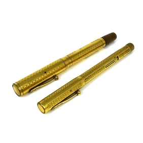 Two antique Waterman's USA Ideal gold-toned fountain pens