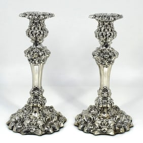 A pair of George III sterling silver candlesticks