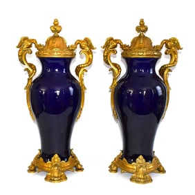 Impressive pair of 19th c. French ormolu-mounted cobalt-blue porcelain vases & covers