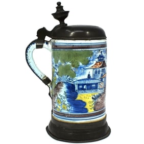 An 18th C. pewter-mounted German faience tankard