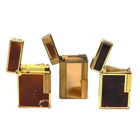Three S.T. Dupont gold-plated and laque-de-chine lighters