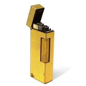 A vintage gold-plated Dunhill lighter