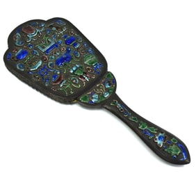 An antique Chinese enameled hand mirror