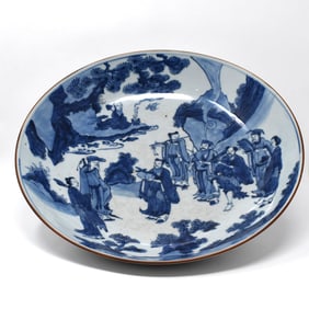 A large Chinese blue and white 'immortals' porcelain bowl /charger