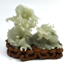 A Chinese Dragon and fish stone carving