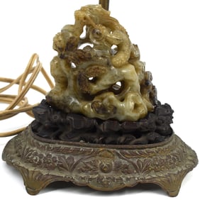 A Chinese carved jade dragon group made into a lamp