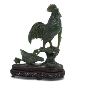 A Chinese Carved Spinach Jade Rooster, hen and chicks group