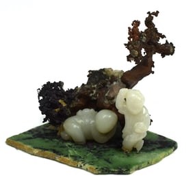 A Chinese jade and stone group with boys