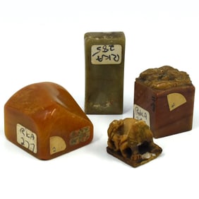 A grouping of Chinese stone carvings & wax seals
