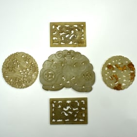 A grouping of five Chinese jade plaques
