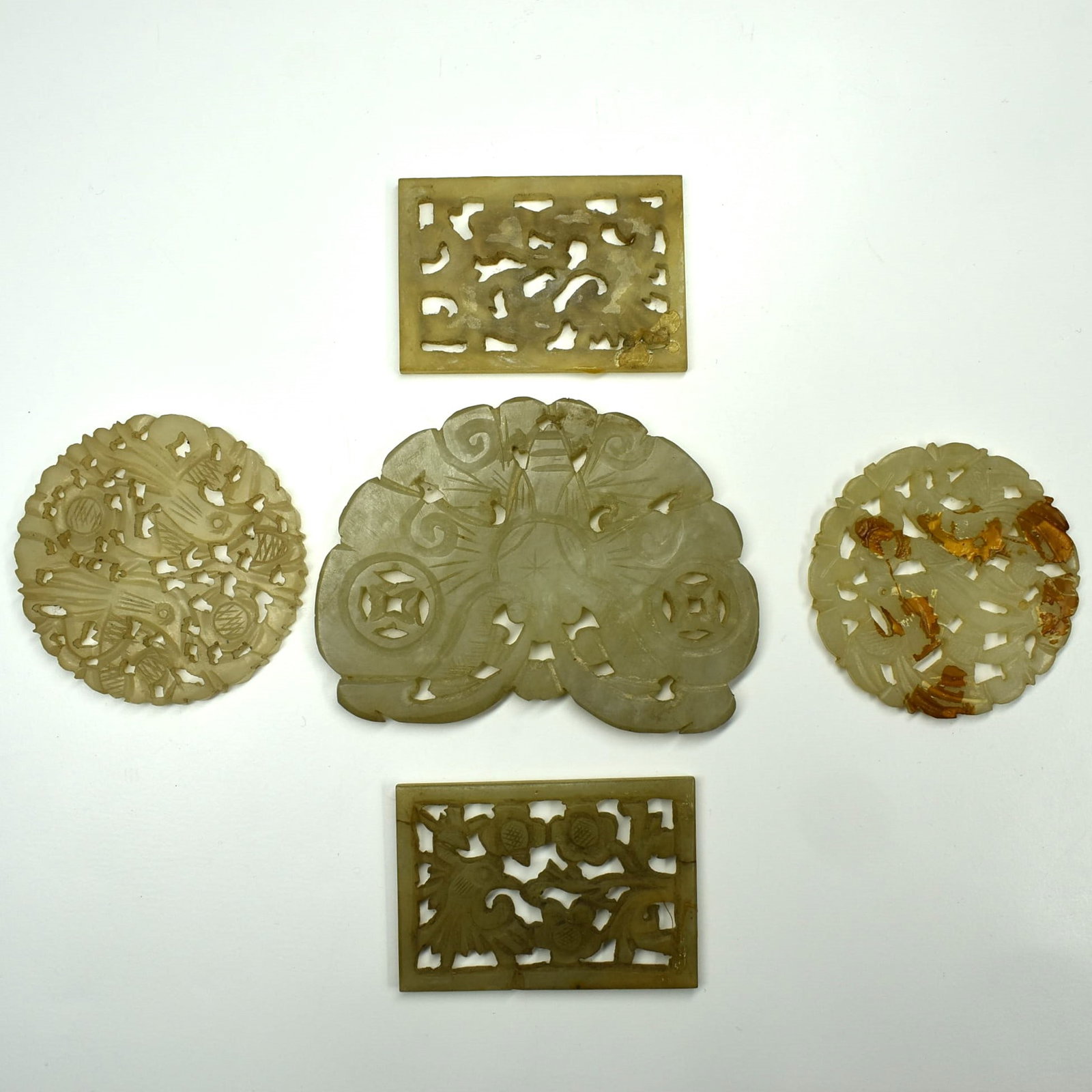 A grouping of five Chinese jade plaques (1 of 11)