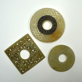 A grouping of three Chinese jade plaques