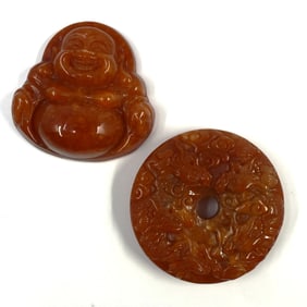 Two Chinese carved stone pendants/ carvings