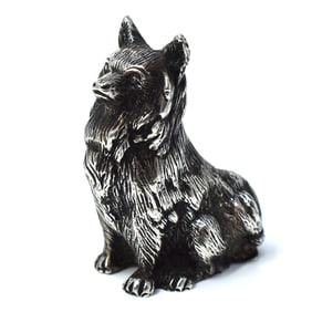 A small Spanish silver model of a dog