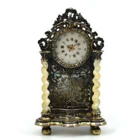 An antique German silver and mother-of-pearl clock by Martin Mayer