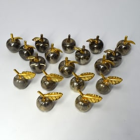 A grouping of 18 vintage silvered brass "apple" place card holders