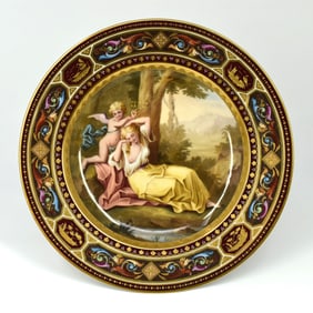 An antique Royal Vienna porcelain plate, Venus & Amor