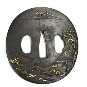 A late Edo period Japanese iron tsuba signed TOMONOBU (?)