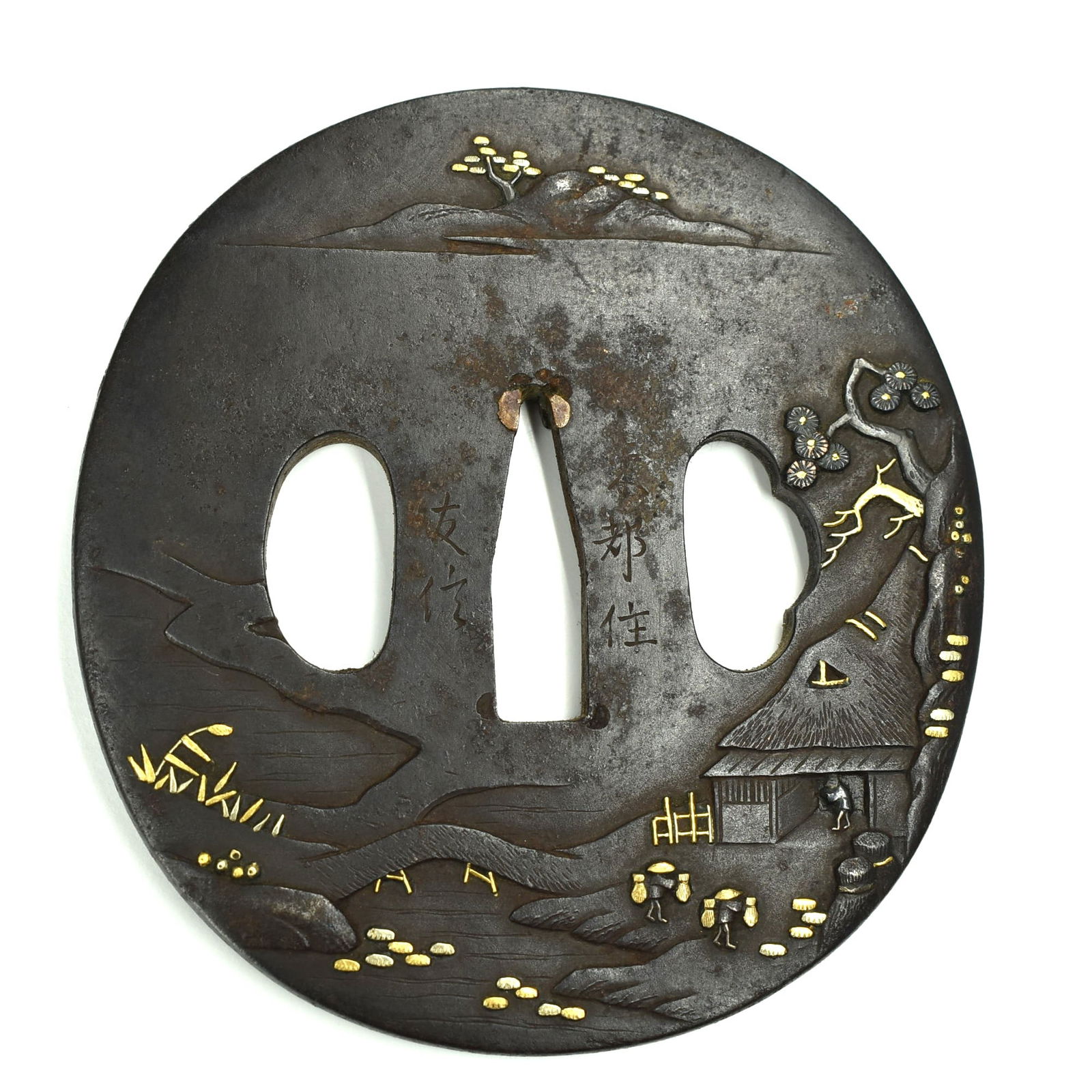 A late Edo period Japanese iron tsuba signed TOMONOBU (?) (1 of 4)