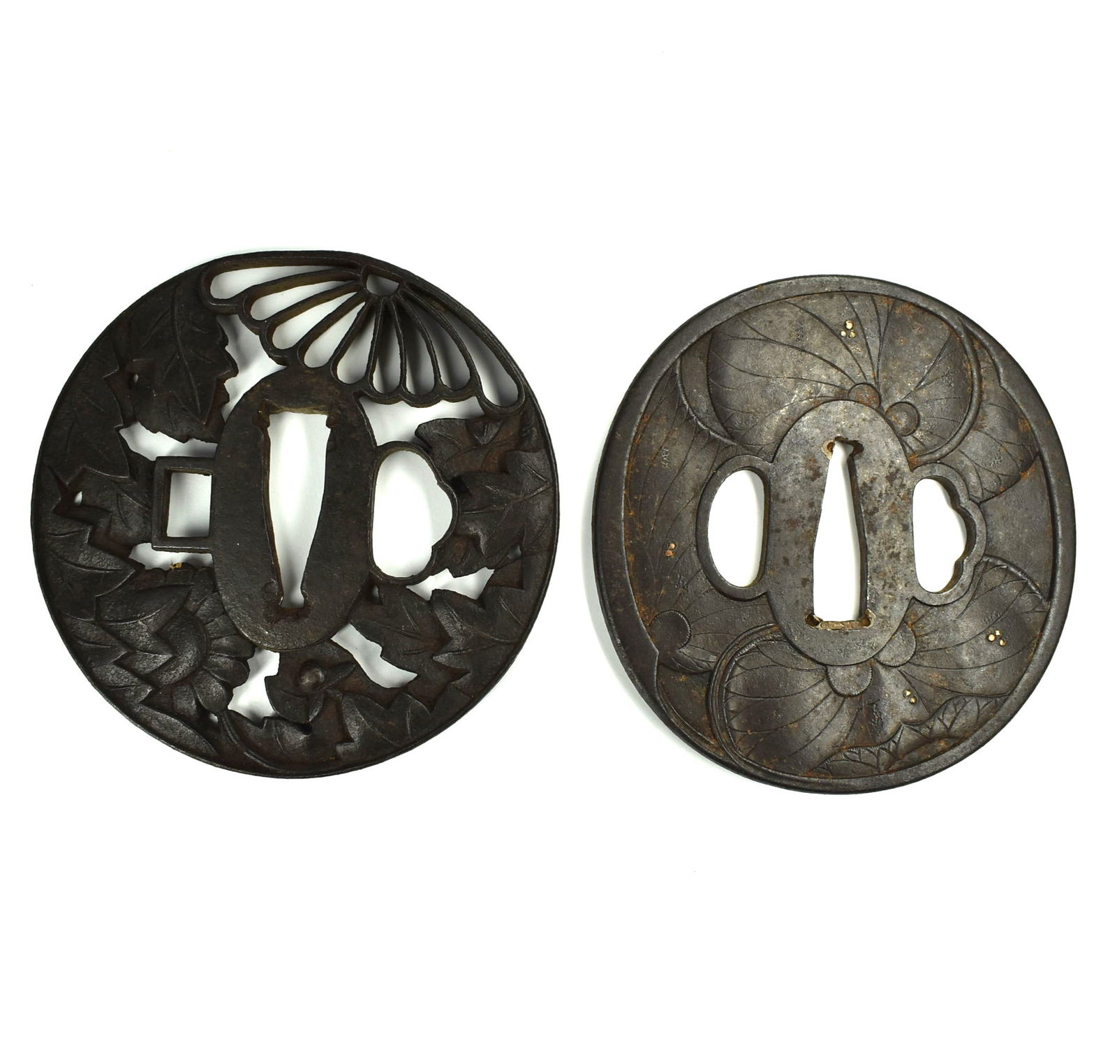 A grouping of two Edo period iron Tsubas featuring stylized foliage (1 of 6)