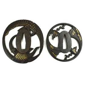 A grouping of two Edo period iron Tsubas with gilt highlights