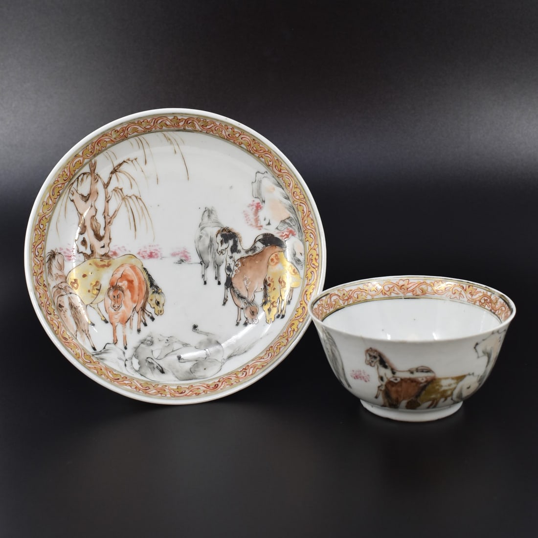 A Chinese export porcelain cup & saucer with horses in landscape, Yongzheng, 1722-1735 (1 of 19)