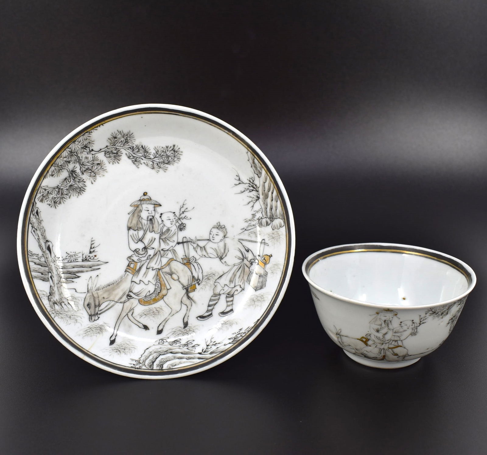 A Chinese 'en grisaille' decorated export porcelain cup & saucer, Yongzheng, 1722-1735 (1 of 20)