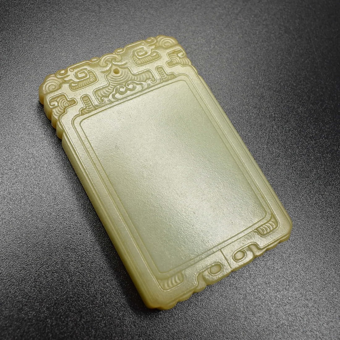 A Chinese celadon jade plaque/ pendant (1 of 12)