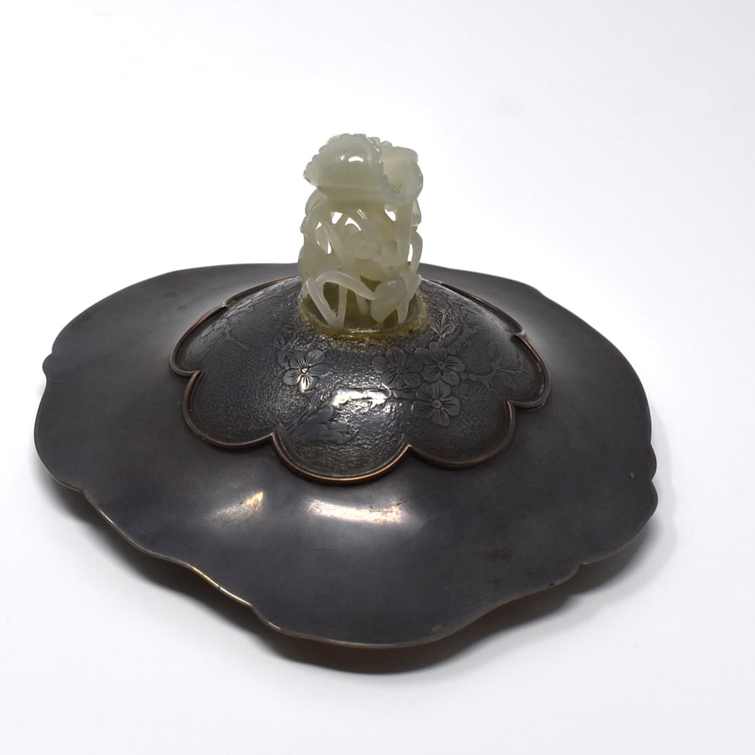 A Chinese carved pale celadon jade finial/ cover (1 of 12)