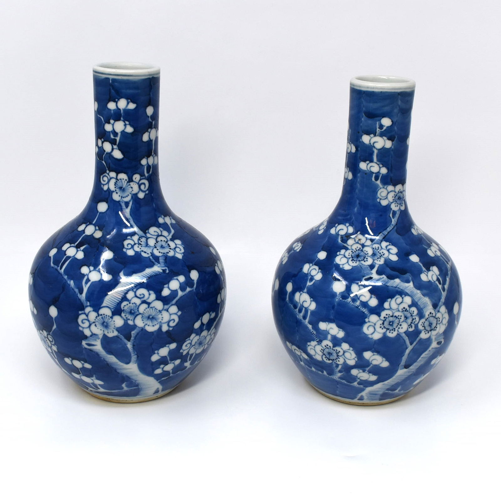 A pair of Chinese blue and white cherry blossom bottle vases (1 of 10)