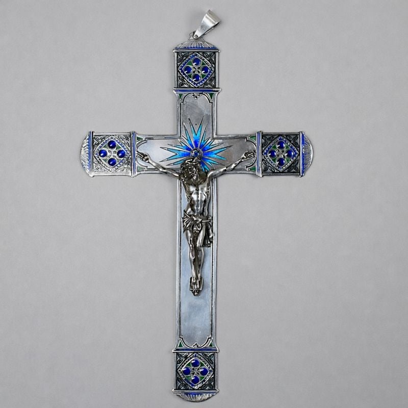 Solid silver and enamel crucifix: An antique or vintage solid silver crucifix with enamel highlights. Two unidentified hallmarks at the bottom of the crucifix. Country of origin unknown. Approximate weight: 7.25 Troy Oz or 225.7g Appr