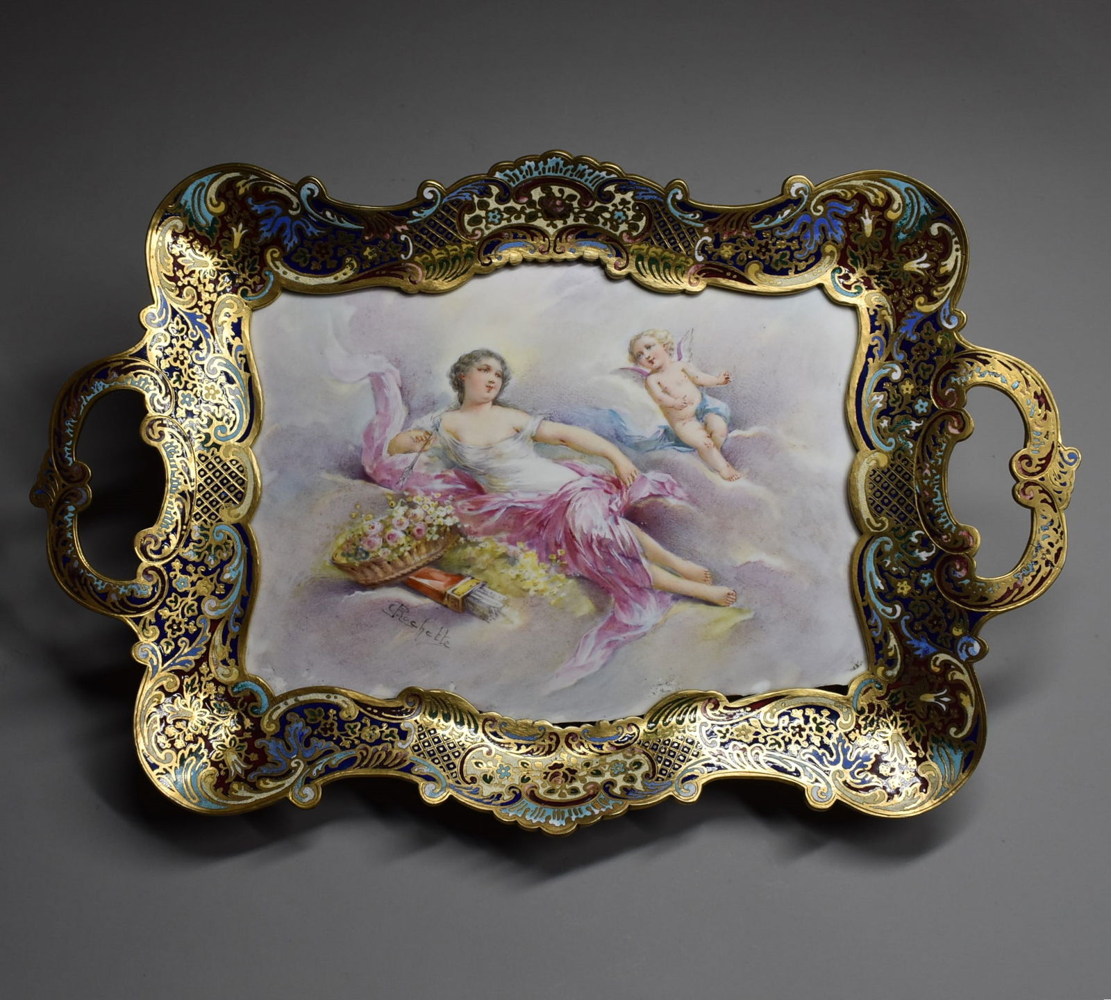 French gilt bronze, champleve enamel and porcelain footed tray circa 1880: An antique French gilt bronze, champleve enamel and porcelain footed tray circa 1880. The central hand-painted porcelain plaque signed 'Rochette' featuring Venus and Cupid. The underside of the tray s