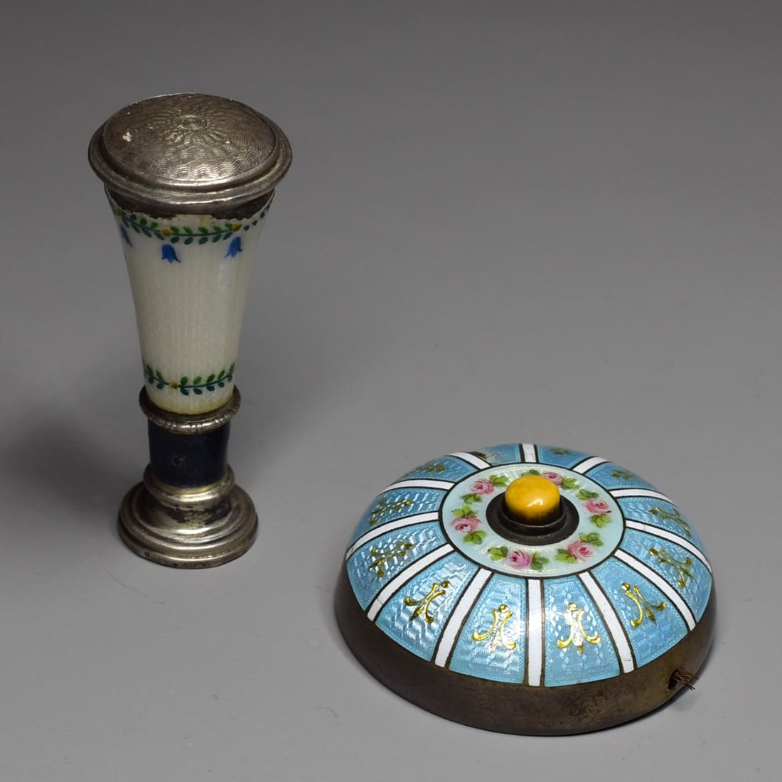 Antique silver and guilloche enamel bell push and wax seal: A grouping of two antique silver and guilloche enamel items including an English sterling silver and enamel bell push and a continental .800 silver and guilloche enamel wax seal. Both items with hallm